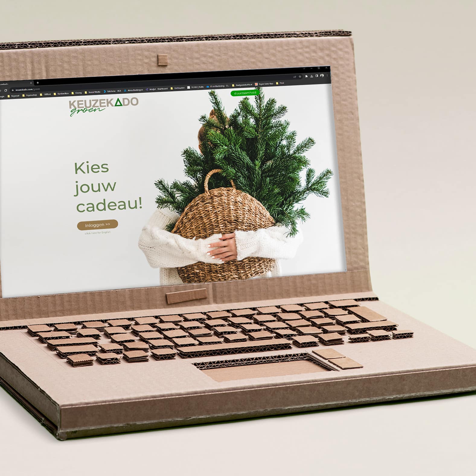 Kartonnen laptop met een geopende website van Keuzekado Groen